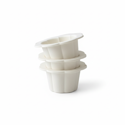 Stacked tart cups on white background